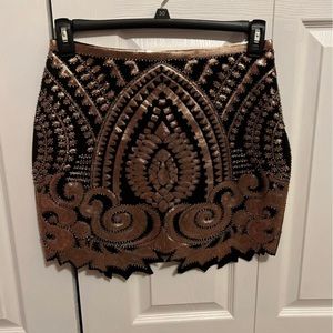 Black and gold skirt . Never worn . Size medium